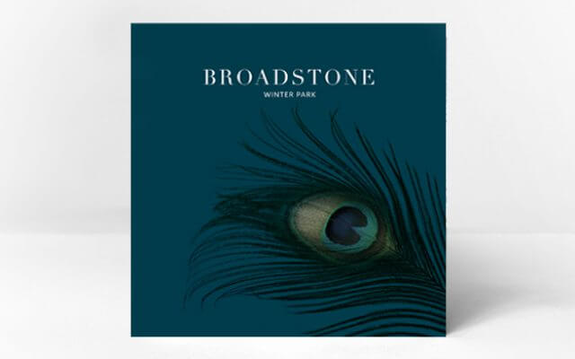 Broadstone Winter Park Brochure Cover with peacock feather