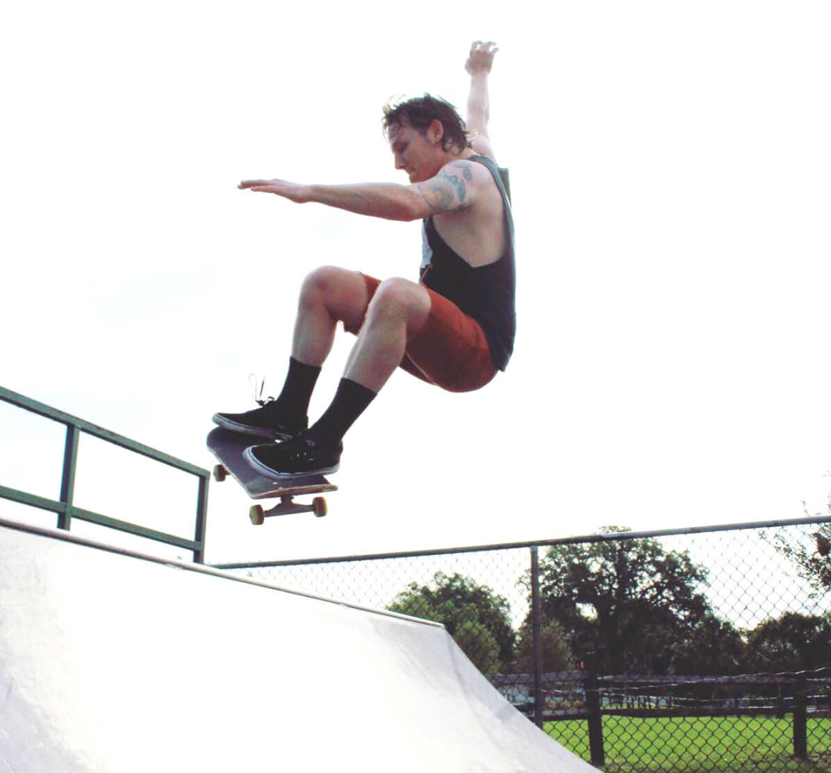 Brad gets some air on a skateboard ramp